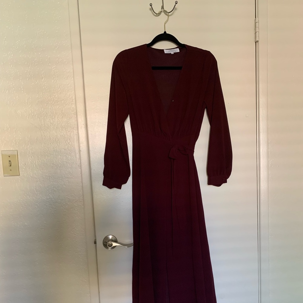 Floor length v-neck long sleeve dress.